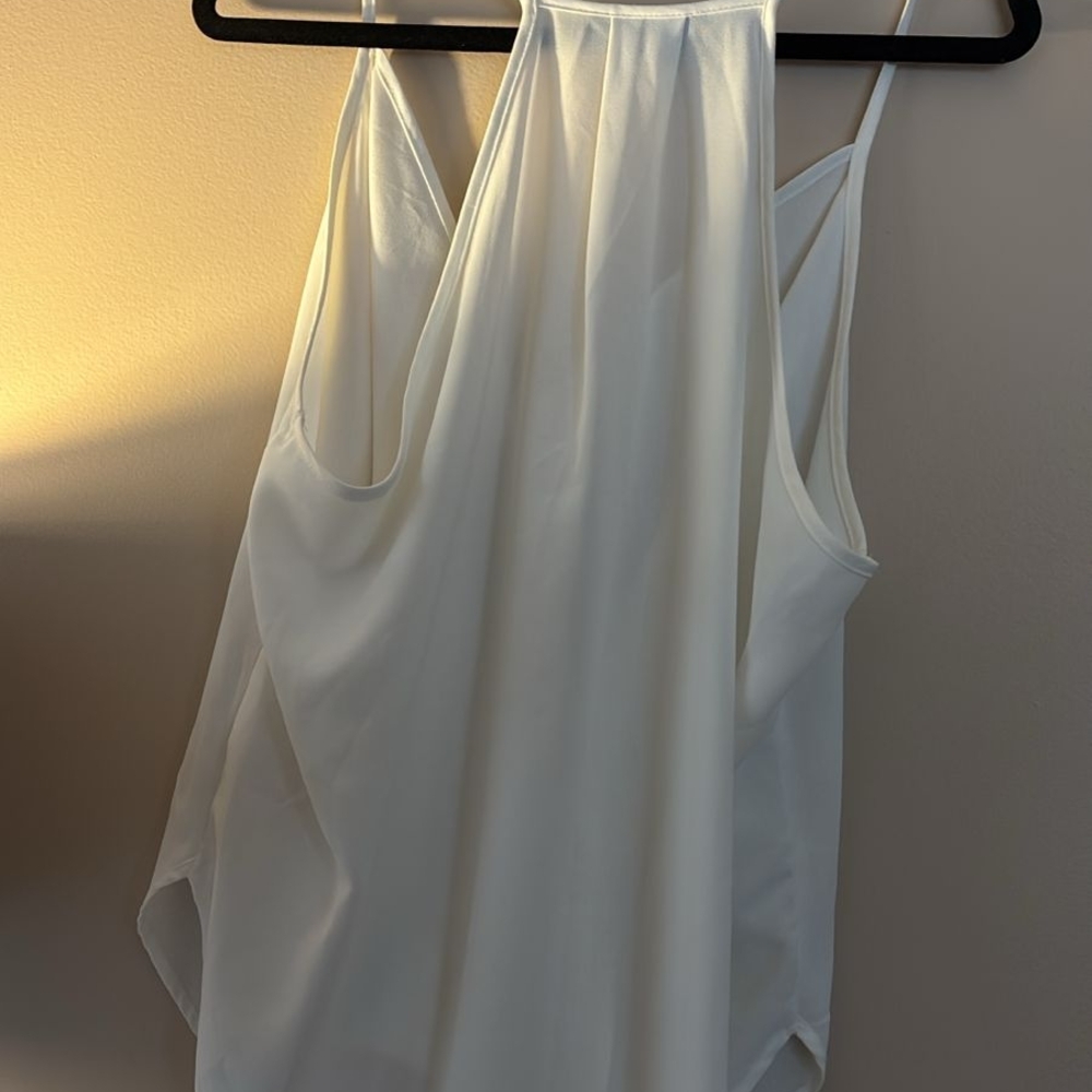Elegant White Sleeveless Blouse
